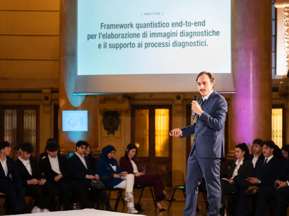 The presentation of Quantum on stage, with a full hall
